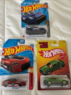 Assorted Nissan Cars - Blue, Red, Green